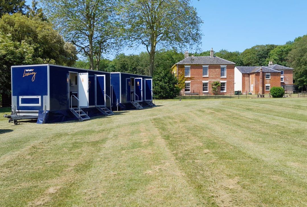 two premium toilet trailers for hire for a wedding