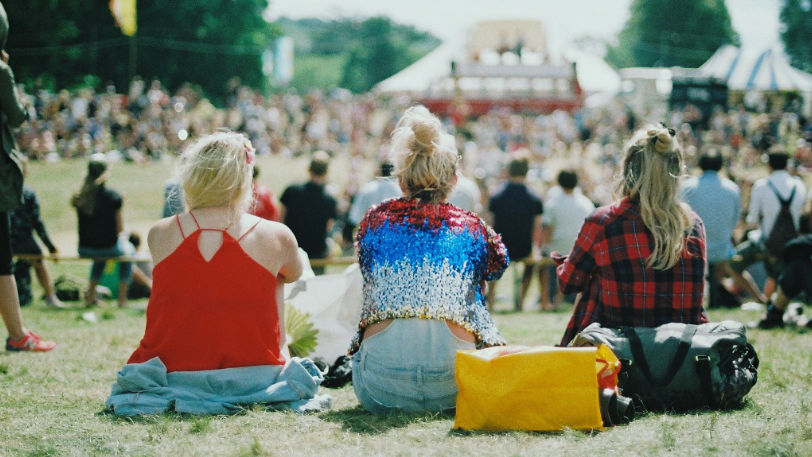 crowd sitting down at festival